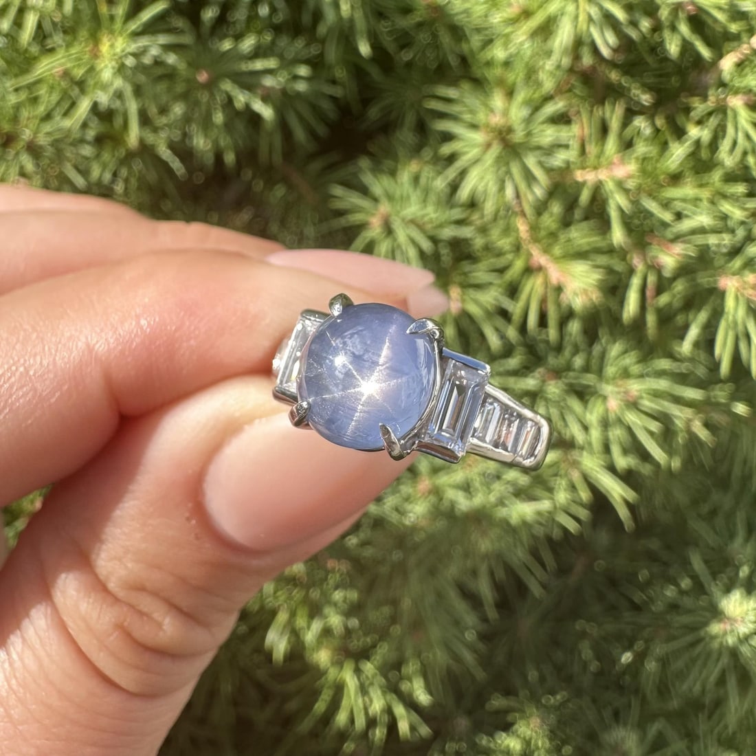 Solid Platinum 6.60ctw Blue Star Sapphire Diamond Cocktail Band Ring: Solid Platinum 6.60ctw Blue Star Sapphire Diamond Cocktail Band Ring This exquisite cocktail ring features a stunning solid platinum band adorned with a captivating blue star sapphire and baguette dia