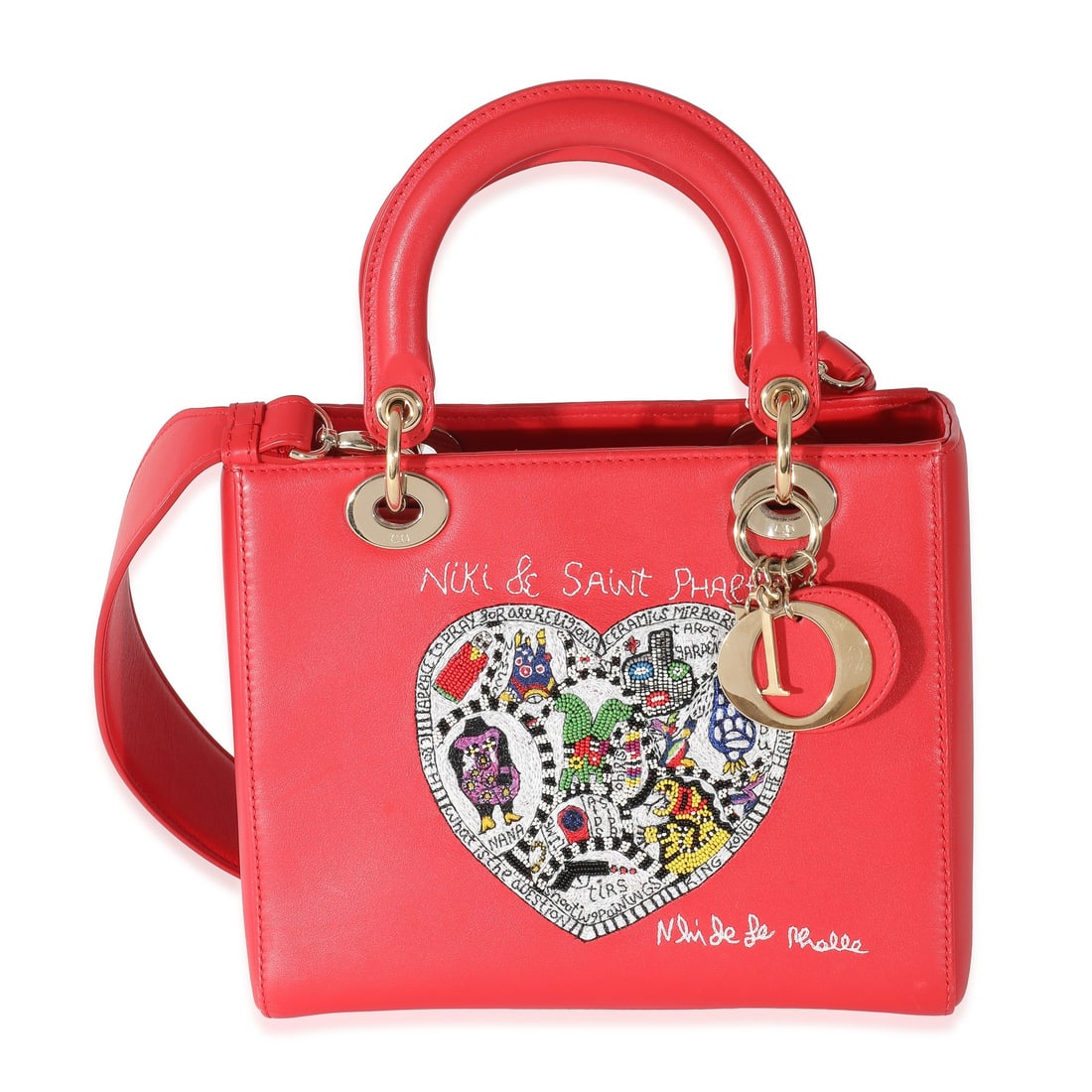 Red Calfskin Medium Lady Dior Shoulder Bag with Removable Straps and Dustbag: Red Calfskin Medium Lady Dior Shoulder Bag with Removable Straps and Dustbag This Christian Dior Medium Lady Dior handbag features supple red calfskin leather with a gold-tone hardware finish. Designe
