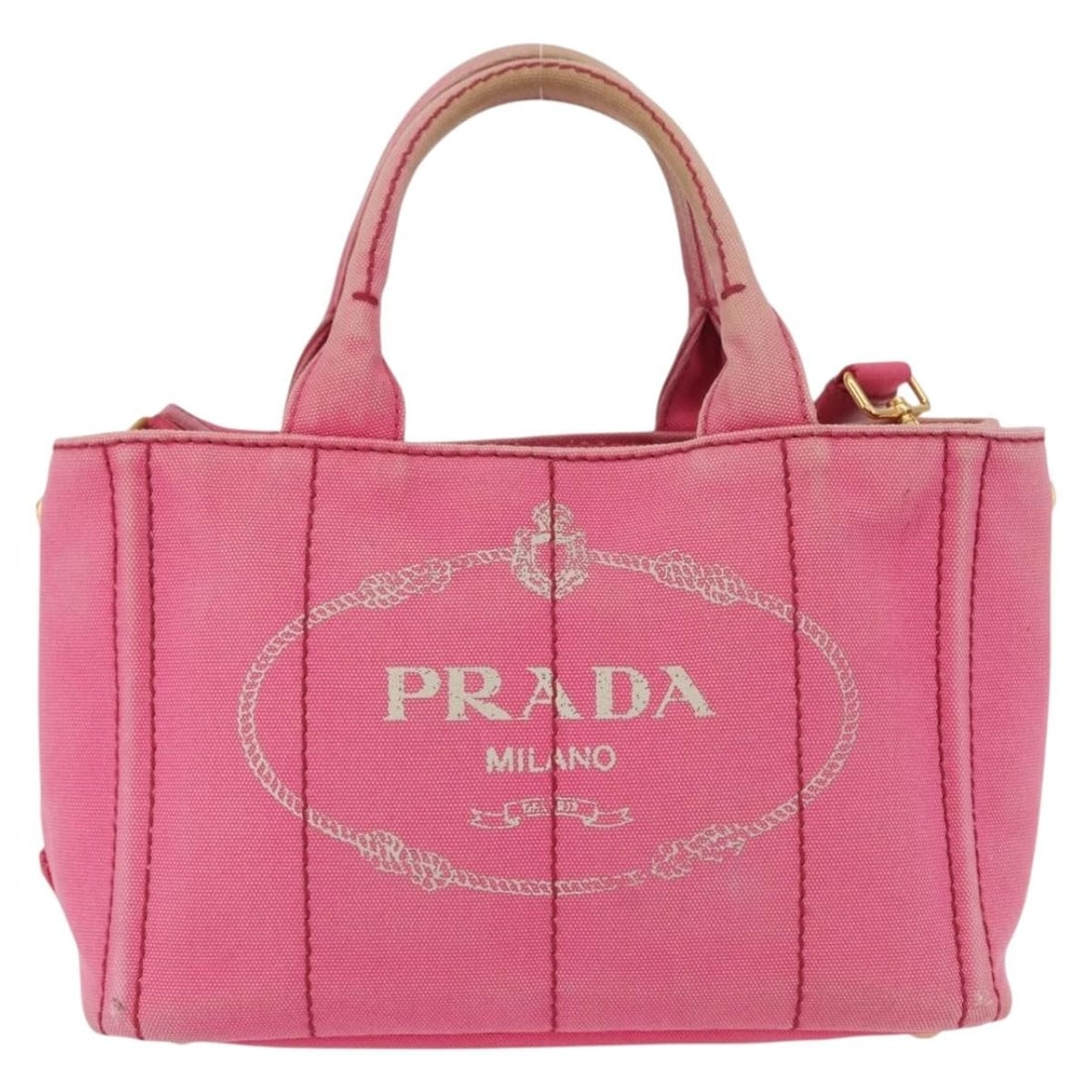 Prada Canapa Convertible Tote Pink Canvas Handbag Italy 28cm: Prada Canapa Convertible Tote Pink Canvas Handbag Italy 28cm This Prada Canapa Convertible Tote is crafted from pink canvas and designed for women. The bag features both handles and a shoulder strap,