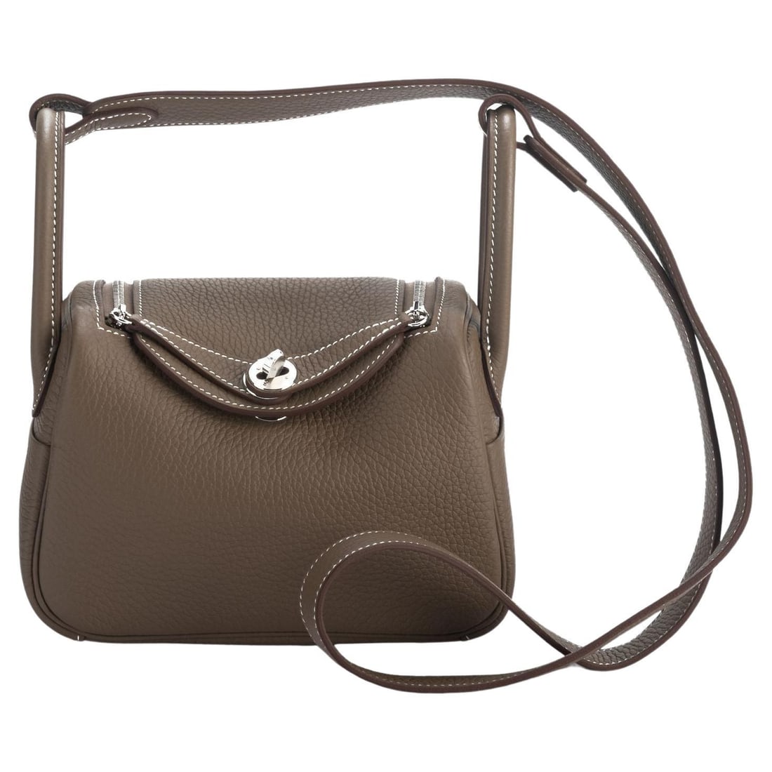 Hermes Mini Lindy Etoupe Togo Leather Crossbody Bag BNIB: Hermes Mini Lindy Etoupe Togo Leather Crossbody Bag BNIB This exquisite Hermes Mini Lindy is crafted from luxurious Etoupe Togo leather and features elegant palladium hardware. With its compact dimens