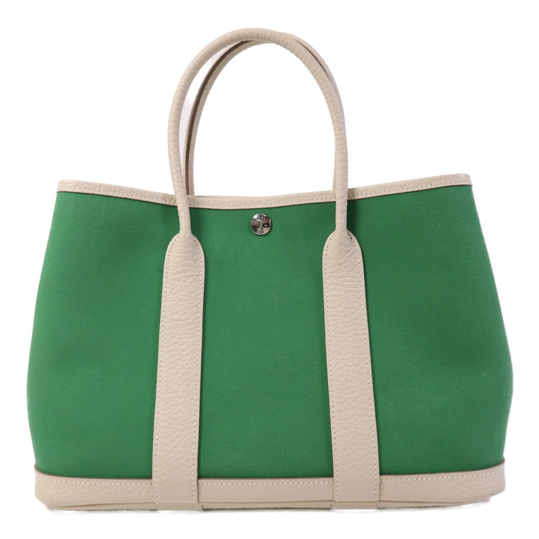 Hermes Garden Party TPM Green Canvas Tote with Palladium Hardware: Hermes Garden Party TPM Green Canvas Tote with Palladium Hardware This Hermes Garden Party TPM tote bag features a canvas exterior in a green shade known as Cactus with contrasting Craie accents. It i