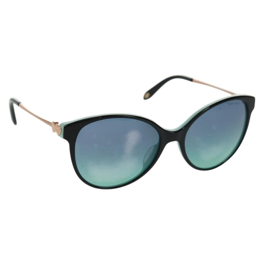 Tiffany and Co Turquoise Blue Plastic Sunglasses with Case and Box: Tiffany and Co Turquoise Blue Plastic Sunglasses with Case and Box These TIFFANY&Co. sunglasses feature a stylish turquoise blue plastic frame, offering a fashionable look. Made in Italy, they come wi