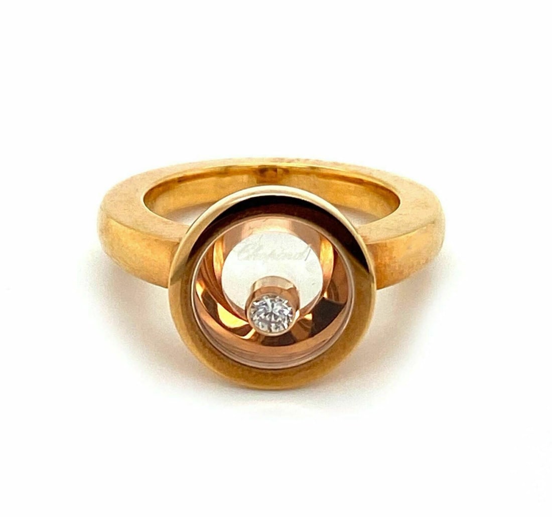 Happy Diamond Collection 18k Rose Gold Ring with Floating Diamond Size 6.5: Happy Diamond Collection 18k Rose Gold Ring with Floating Diamond Size 6.5 This Chopard Happy Diamond ring features a floating diamond set in 18k rose gold. The round ring is crafted with signature Ch