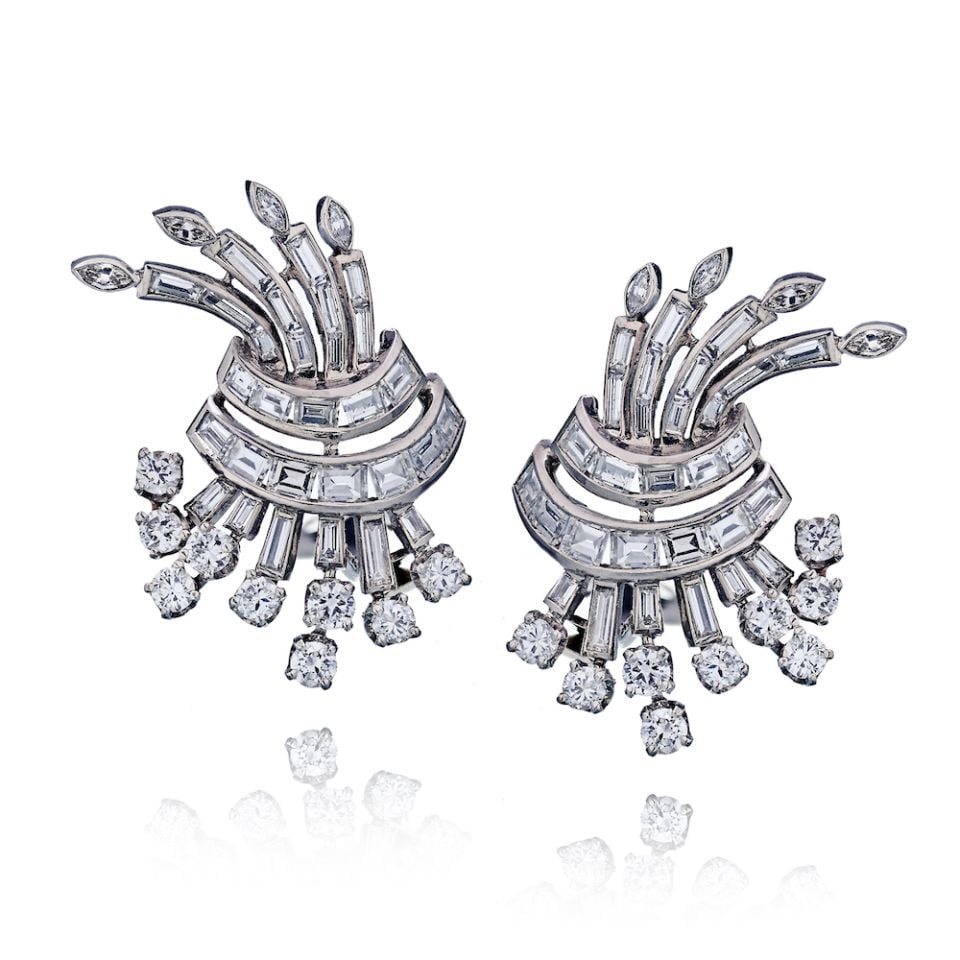 Vintage Retro 9.50 Carat Platinum Diamond Earrings: Vintage Retro 9.50 Carat Platinum Diamond Earrings These exquisite earrings feature a stunning retro design crafted from high-quality platinum. Each earring showcases a remarkable total diamond weight