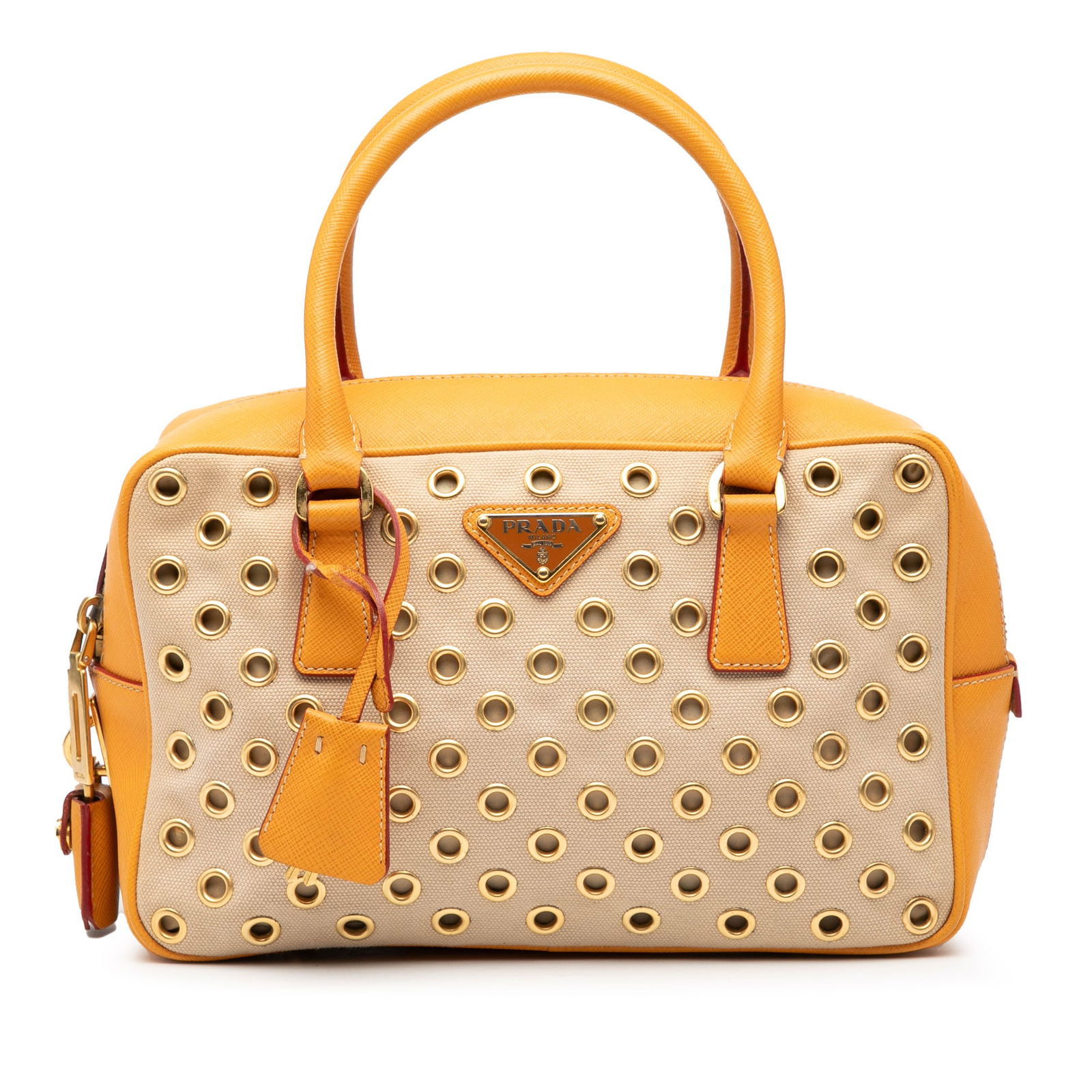 Prada Bauletto Small Canvas Handbag with Saffiano Leather Trim and Grommets: Prada Bauletto Small Canvas Handbag with Saffiano Leather Trim and Grommets This Prada Small Saffiano Trimmed Canvas Grommet Bauletto Bag features a canvas and saffiano leather body with grommet embel