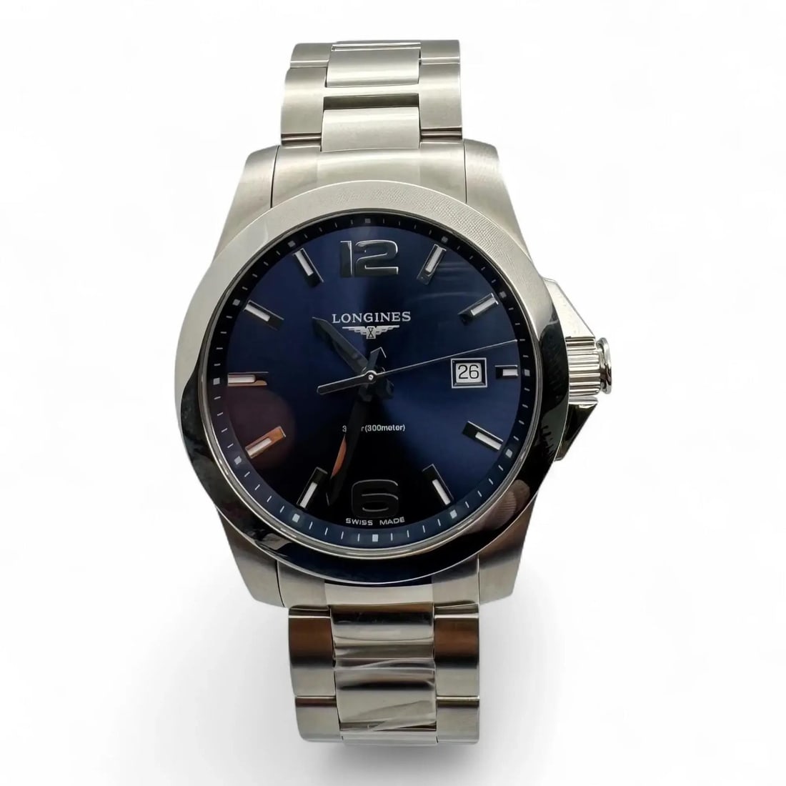 Blue Sunburst Dial Longines Conquest Quartz 41mm Stainless Steel Wristwatch L3.759.4.96.6: Blue Sunburst Dial Longines Conquest Quartz 41mm Stainless Steel Wristwatch L3.759.4.96.6 This Longines Conquest wristwatch features a polished 41 mm stainless steel case with a blue sunburst dial and