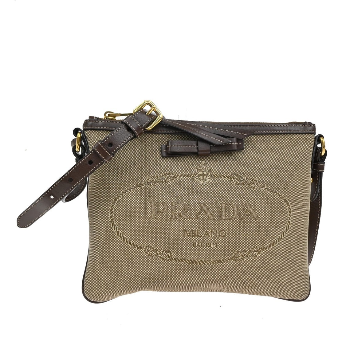 Prada Canvas Crossbody Bag with Dual Zipper in Brown: Prada Canvas Crossbody Bag with Dual Zipper in Brown This Prada Logo Double Zip Crossbody Bag is crafted from brown canvas and designed for women. It features two zip compartments for organized storag