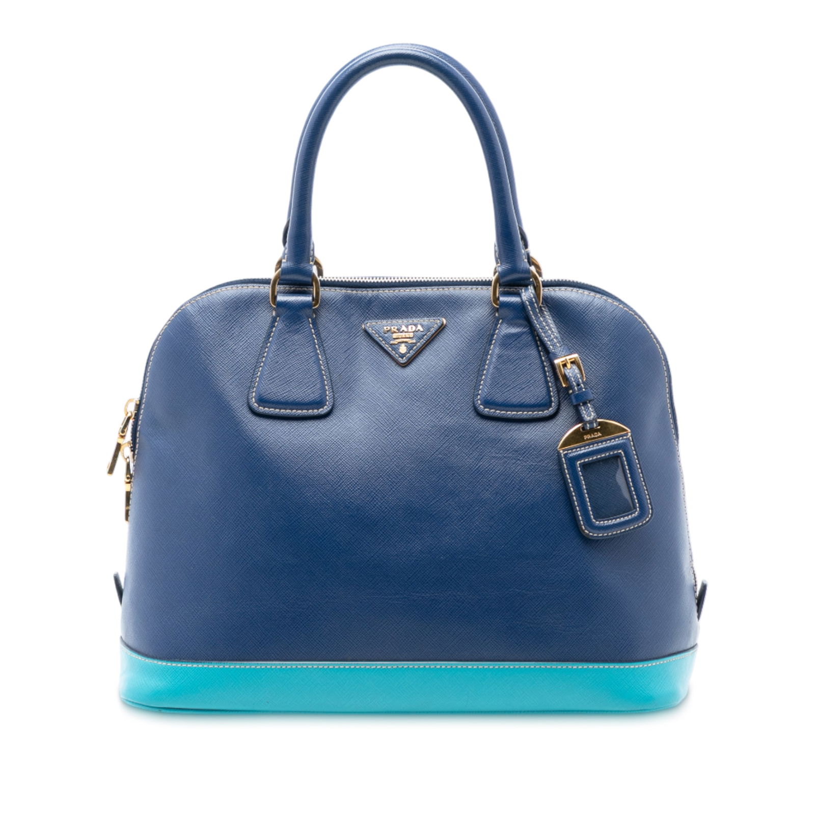 Prada Saffiano Lux Promenade Blue Leather Dome Bag with Top Zip: Prada Saffiano Lux Promenade Blue Leather Dome Bag with Top Zip This Prada Bicolor Saffiano Lux Promenade Dome Handbag features a saffiano leather body in blue, rolled leather handles, a top zip closu