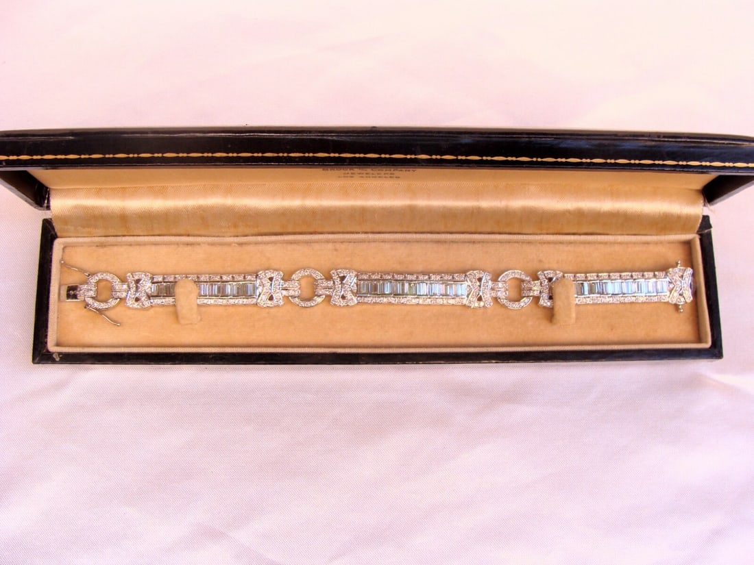 1950s French 18K White Gold Diamond Bracelet 4.25 ct: 1950s French 18K White Gold Diamond Bracelet 4.25 ct This exquisite 1950's French bracelet is crafted from 18K white gold and adorned with approximately 4.25 ct of dazzling white diamonds. The charm-s