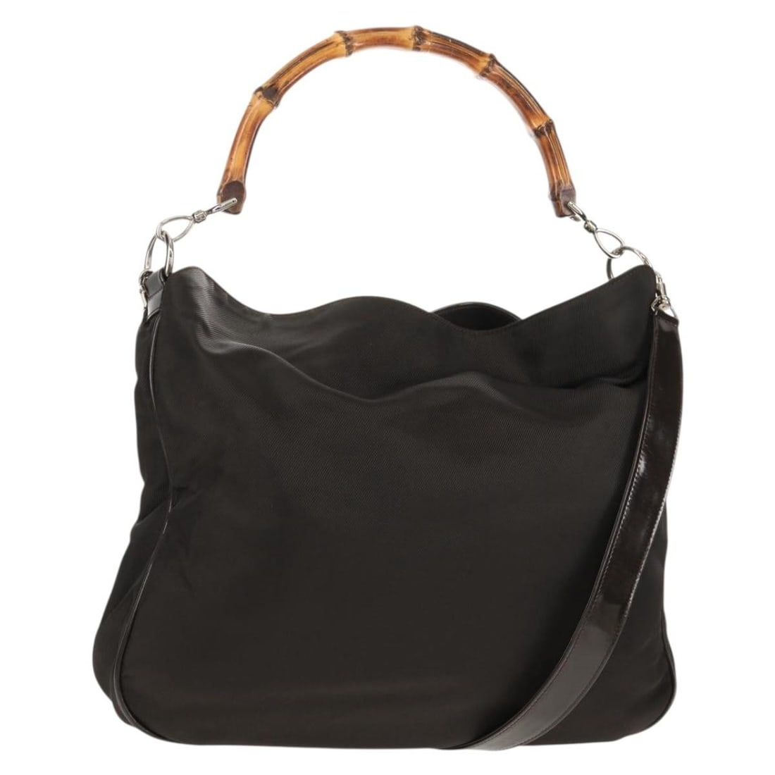 Gucci Brown Nylon Vintage Bamboo Shoulder Handbag for Women: Gucci Brown Nylon Vintage Bamboo Shoulder Handbag for Women This Gucci Vintage Bamboo Shoulder Bag features a classic brown nylon exterior with distinctive bamboo detailing. Designed for women, the ba