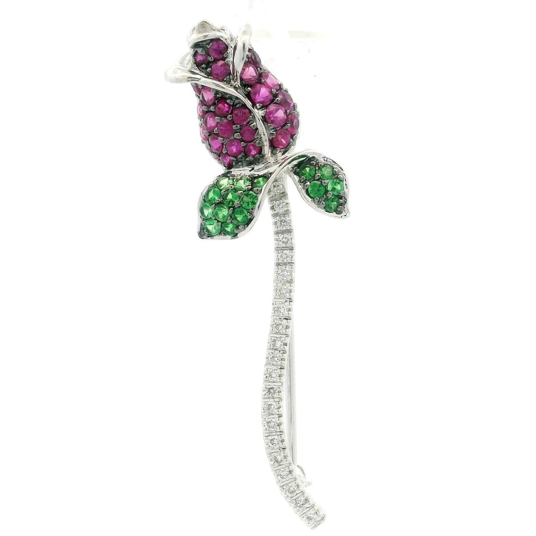 14K White Gold Ruby Tsavorite Diamond Floral Brooch Pin 1.65ctw: 14K White Gold Ruby Tsavorite Diamond Floral Brooch Pin 1.65ctw This stunning 14k white gold brooch showcases a beautiful rose flower design adorned with vivid red rubies, vibrant green tsavorites, an