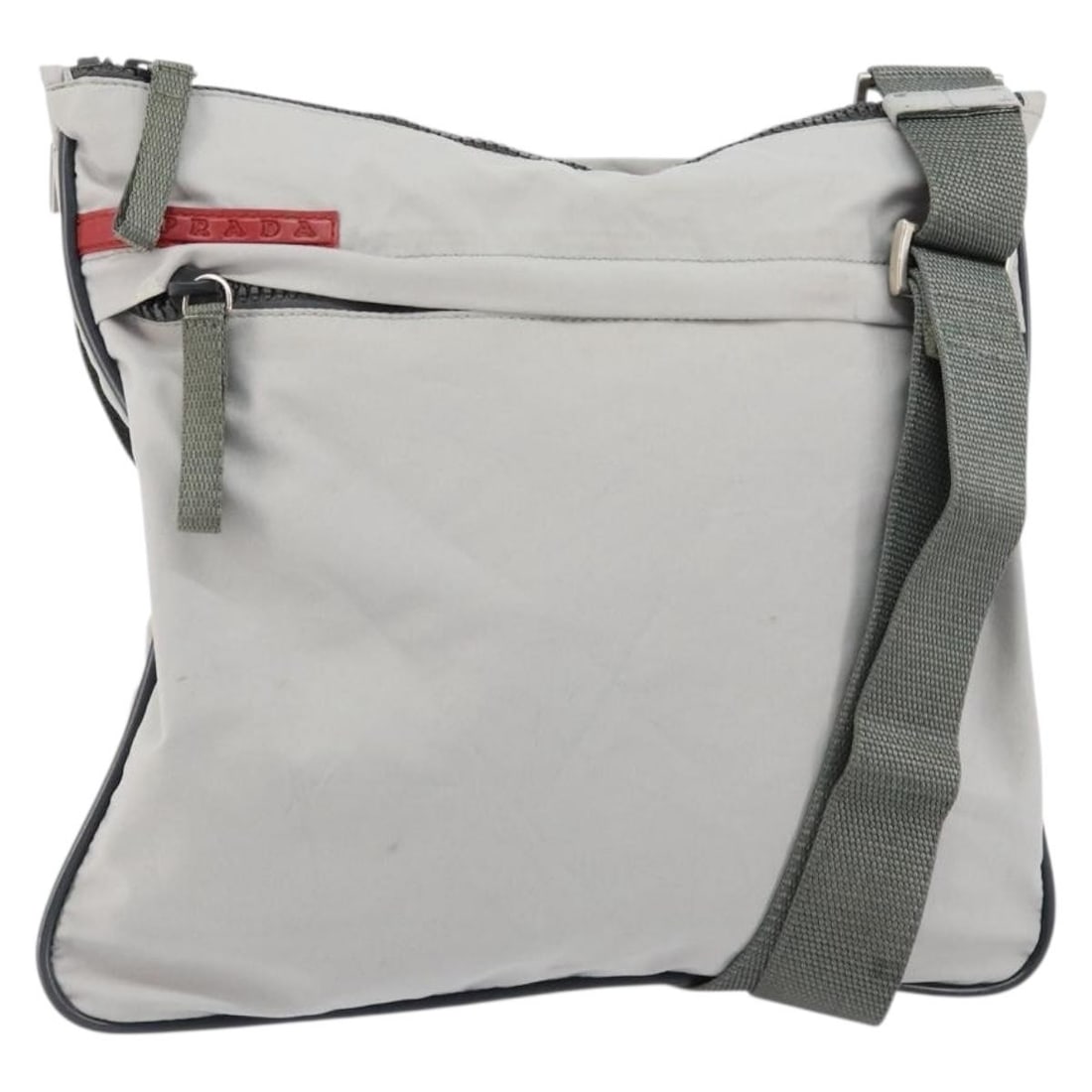 Prada Gray Nylon Vintage Sport Shoulder Bag for Women: Prada Gray Nylon Vintage Sport Shoulder Bag for Women This Prada Vintage Sport Shoulder bag is crafted from gray nylon and designed for women. The bag features a spacious interior and practical should