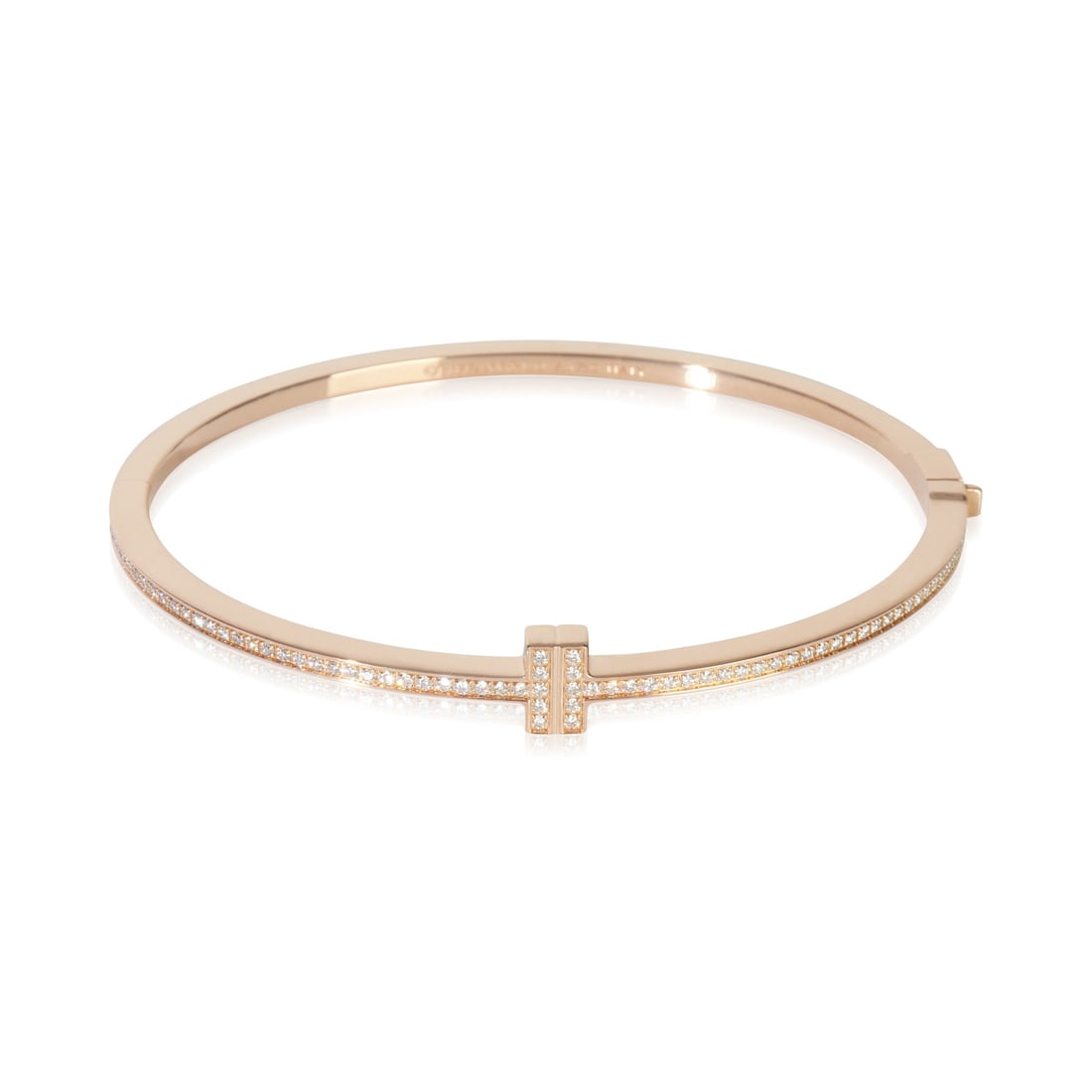 18k Rose Gold Diamond Tiffany T Hinged Bracelet with Box and Papers: 18k Rose Gold Diamond Tiffany T Hinged Bracelet with Box and Papers This Tiffany & Co. Tiffany T Hinged Bracelet is crafted from 18k rose gold and features round brilliant diamonds with a total carat