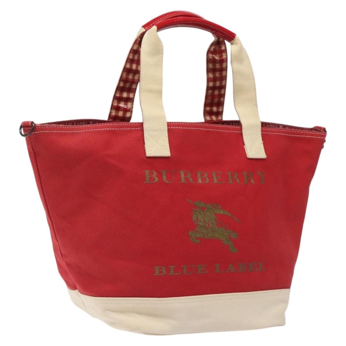 Burberry Blue Label Canvas Tote in Red 23cm x 26cm x 18cm: Burberry Blue Label Canvas Tote in Red 23cm x 26cm x 18cm This Burberry Blue Label tote bag features a vibrant red canvas exterior and is designed for women. The bag has signs of use, including rubbin