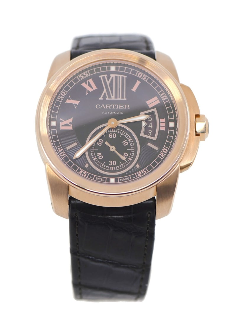 Cartier Calibre 18K Rose Gold Watch W7100007 with Box and Papers: Cartier Calibre 18K Rose Gold Watch W7100007 with Box and Papers Experience elegance with the Cartier Calibre 18K Rose Gold Watch, featuring a sophisticated mechanical (automatic) movement. This exqui