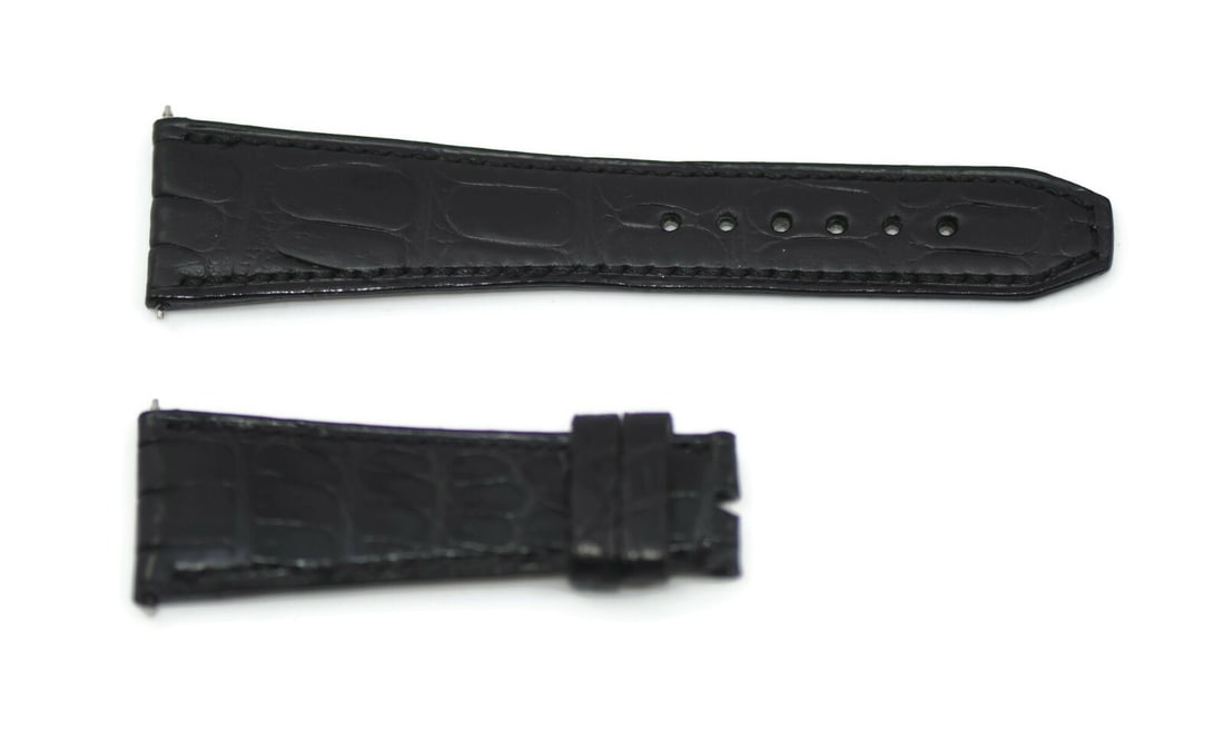 Authentic Pierre Kunz Black Leather Watch Strap 22mm: Authentic Pierre Kunz Black Leather Watch Strap 22mm Elevate your timepiece with this authentic Pierre Kunz black leather strap, designed for style and durability. The strap features a sleek black fin