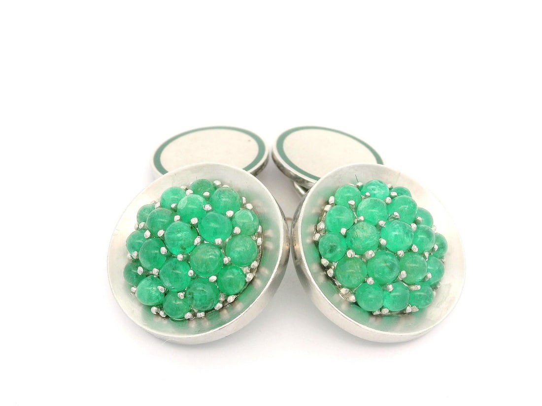 Vintage Natural Emerald Cluster Cufflinks in Gold and Platinum: Vintage Natural Emerald Cluster Cufflinks in Gold and Platinum Elevate your accessory collection with these vintage collectible cufflinks featuring a stunning cluster of natural cabochon emeralds. Eac