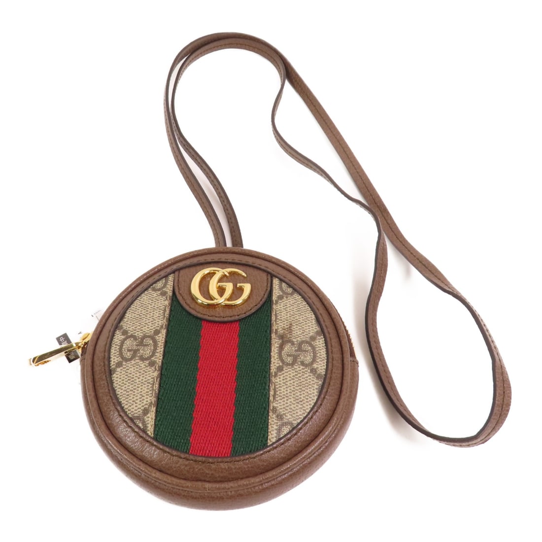 Gucci Ophidia Brown Coated Canvas Coin Purse With Neck Strap: Gucci Ophidia Brown Coated Canvas Coin Purse With Neck Strap This Gucci Ophidia GG coin purse features a brown PVC coated canvas construction and includes a neck strap for convenient carrying. Crafted