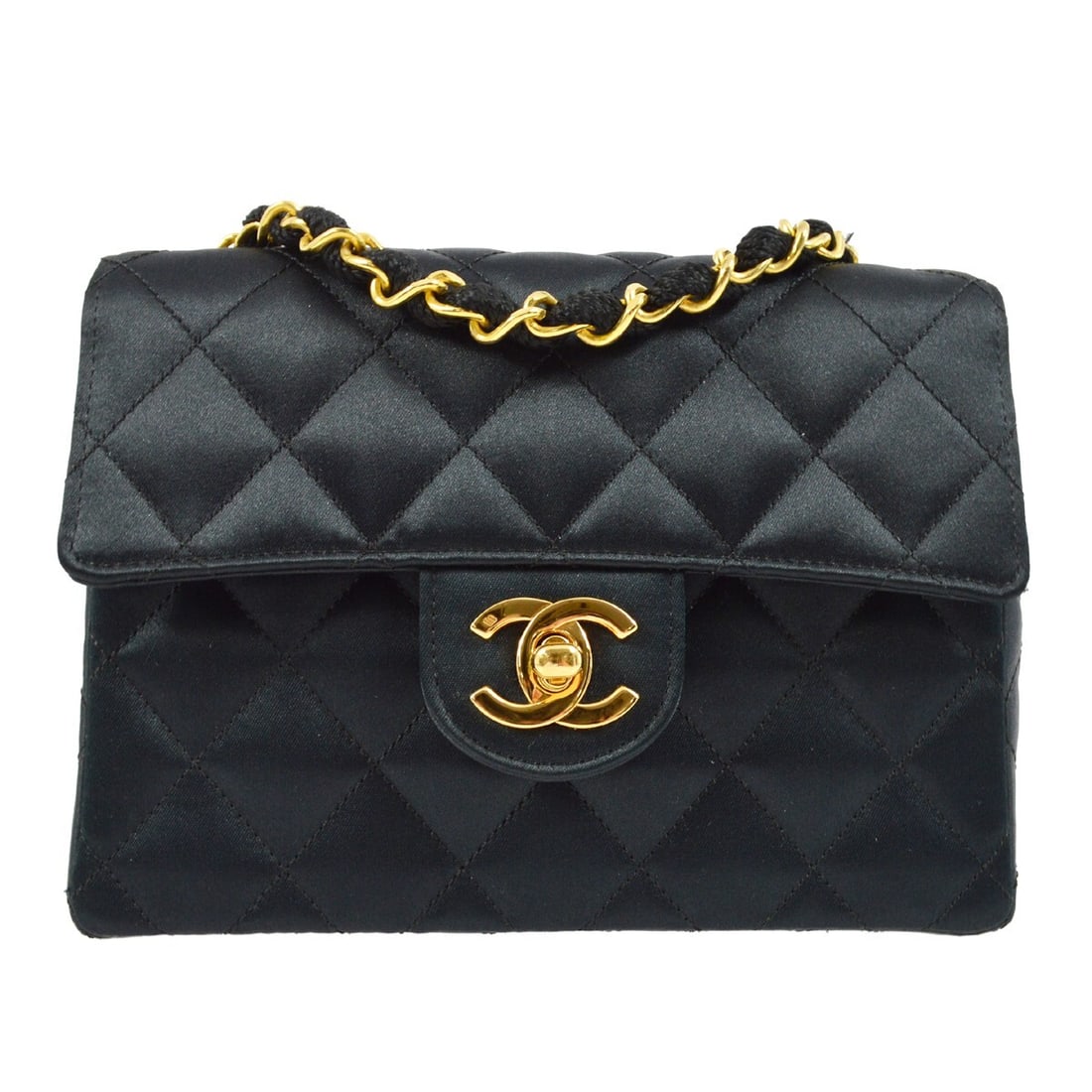Chanel Black Satin Mini Classic Flap Shoulder Bag 7x5: Chanel Black Satin Mini Classic Flap Shoulder Bag 7x5 Elevate your accessory collection with this Chanel Black Satin Mini Classic Square Flap Shoulder Bag. This stylish piece features a chic matelasse