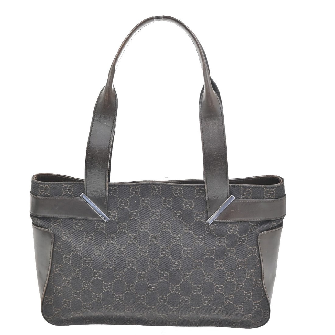 Gucci Brown Canvas Vintage Shoulder Bag 32cm by 21cm by 7cm: Gucci Brown Canvas Vintage Shoulder Bag 32cm by 21cm by 7cm This Gucci vintage shoulder bag for women features brown coated canvas with the iconic GG pattern. It offers a classic, timeless design suit