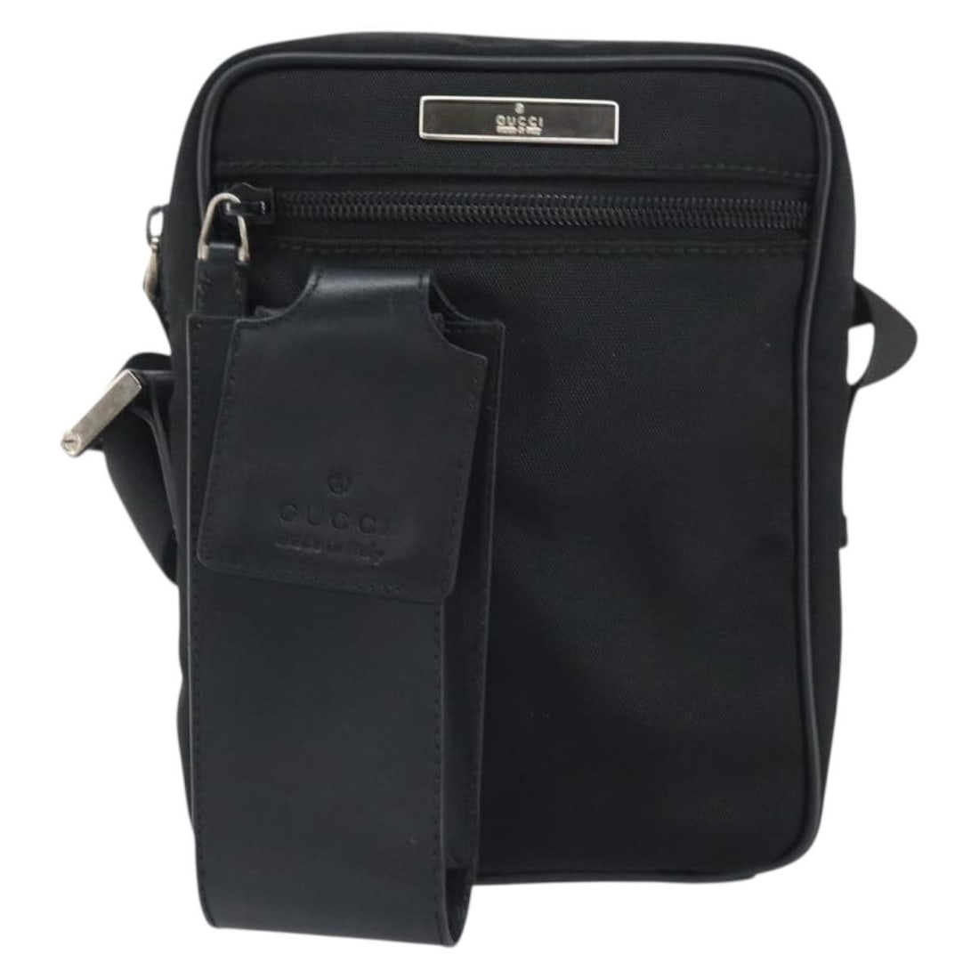 Black Nylon Gucci Vintage Women's Shoulder Bag: Black Nylon Gucci Vintage Women's Shoulder Bag This Gucci vintage shoulder bag is crafted from black nylon and designed for women. The bag features a shoulder strap and metal fittings, with some signs