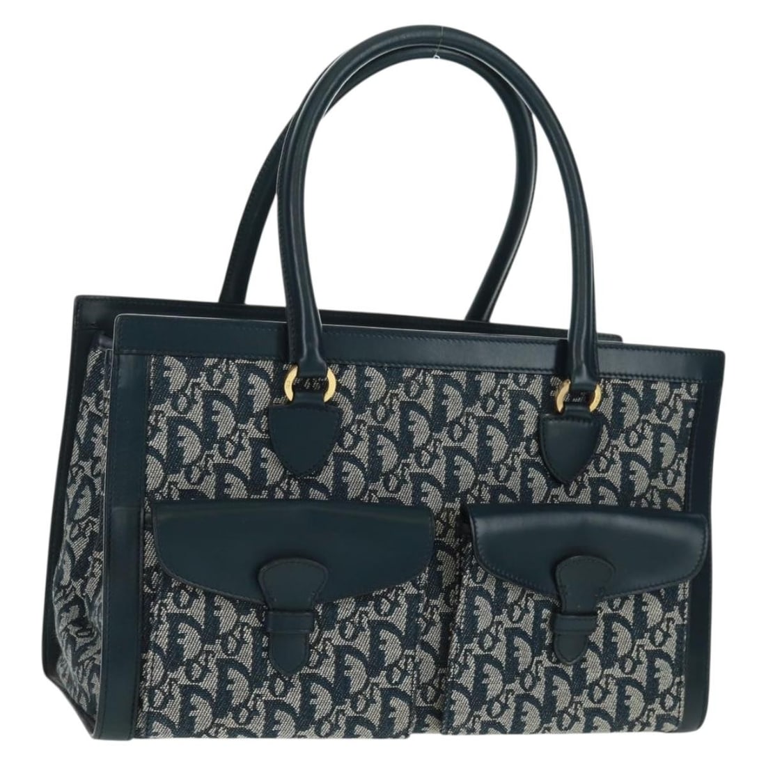 Navy Trotter Canvas Christian Dior Handbag Gold Tone Accents: Navy Trotter Canvas Christian Dior Handbag Gold Tone Accents This Christian Dior Trotter canvas handbag features a navy and gold color scheme and is crafted in Italy. The bag offers a spacious interio