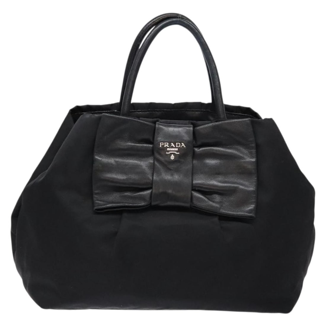 Prada Nylon Bow Tote Handbag with Leather Trim Black: Prada Nylon Bow Tote Handbag with Leather Trim Black This Prada Bow Tote designed for women features a black nylon exterior with leather accents. It measures 28cm x 23cm x 13cm and is crafted in Italy