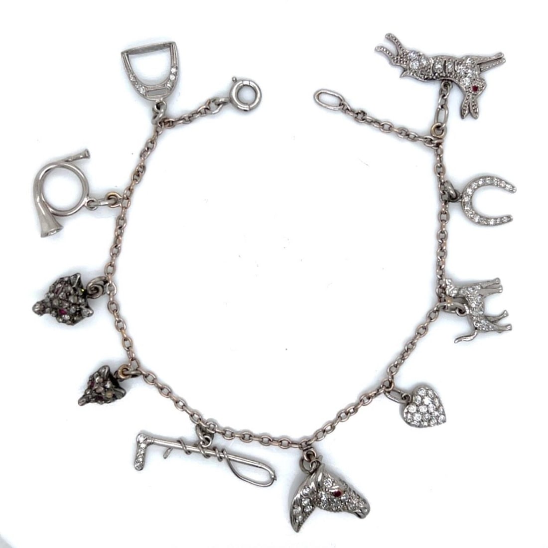 Art Deco Platinum Diamond Charm Bracelet 3.00 Ct Diamonds 3 Rubies: Art Deco Platinum Diamond Charm Bracelet 3.00 Ct Diamonds 3 Rubies This exquisite Art Deco charm bracelet is crafted in platinum and features a stunning array of approximately 3.00 Ct. of diamonds, co