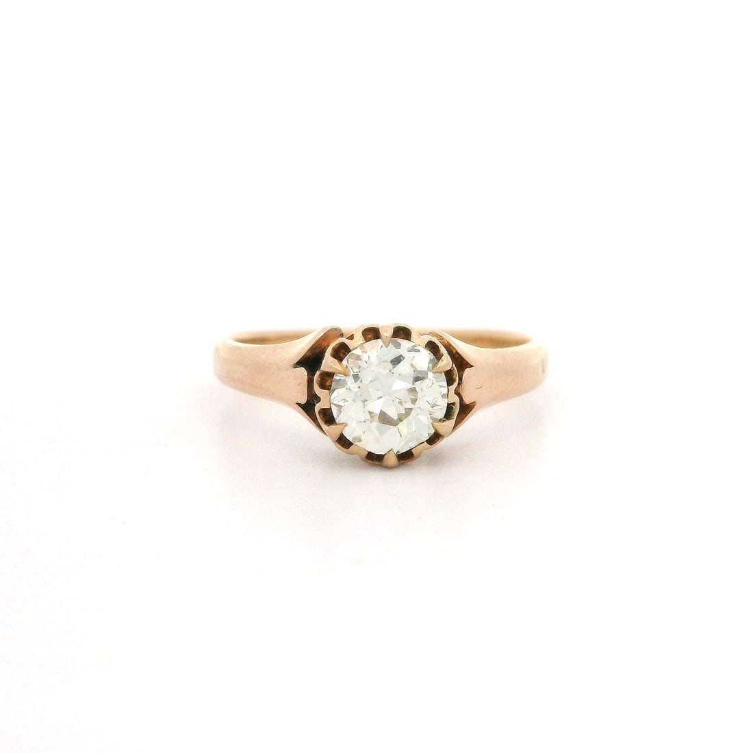 Victorian 14k Gold 0.60ct Diamond Floral Solitaire Ring: Victorian 14k Gold 0.60ct Diamond Floral Solitaire Ring Discover this exquisite Antique Victorian ring, featuring a stunning 0.60ct Old European Cut diamond. The diamond exhibits a J color grade and V