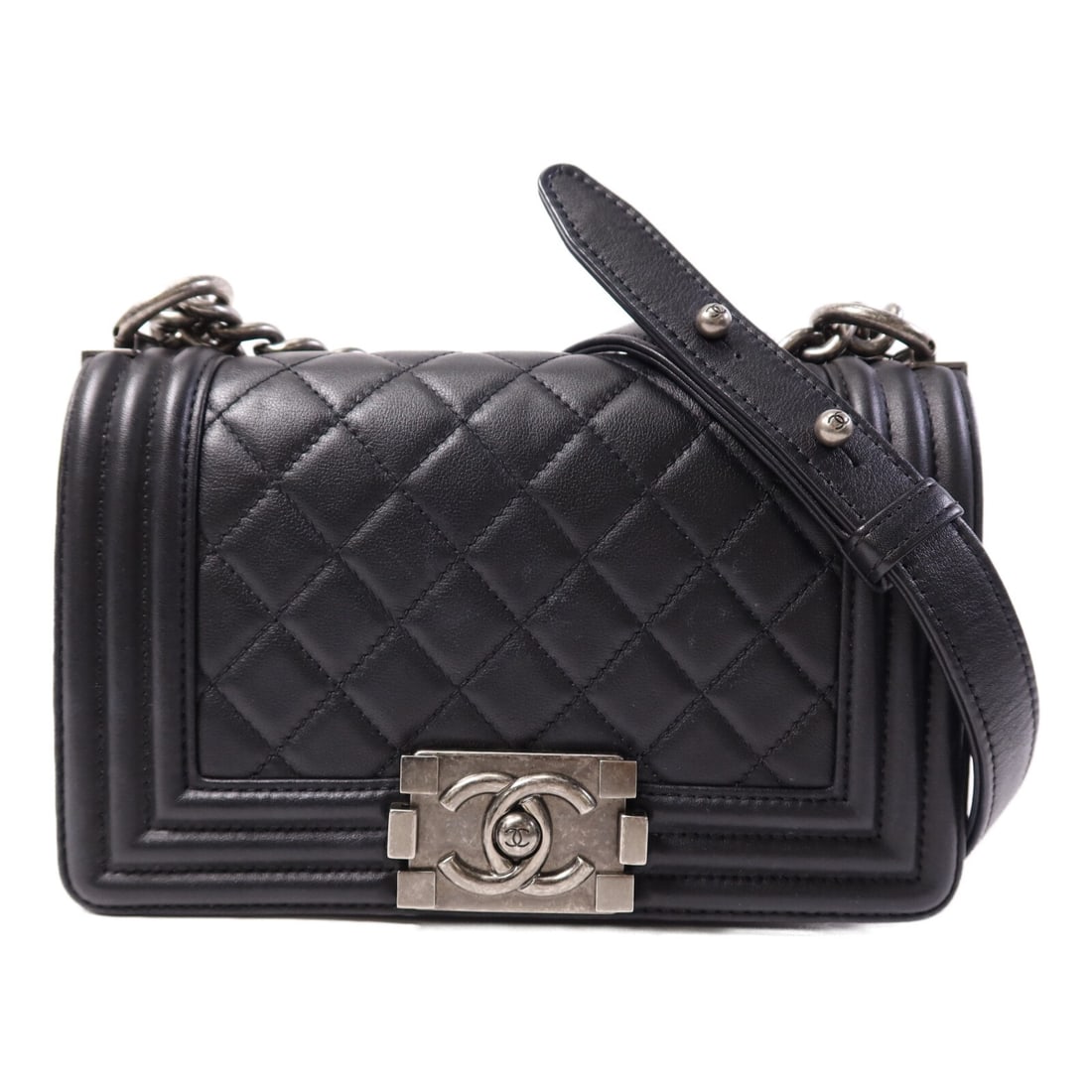 Chanel Boy 20 Shoulder Bag Black Lambskin Leather Silver Tone Chain: Chanel Boy 20 Shoulder Bag Black Lambskin Leather Silver Tone Chain This CHANEL Boy 20 chain shoulder bag is crafted from black calfskin leather and features silver-tone hardware. Made in France, it o