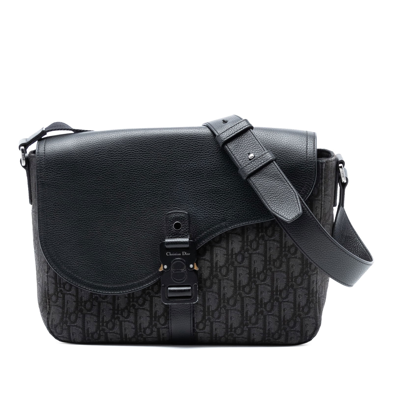 Dior Oblique Canvas and Calfskin Medium Saddle Messenger Bag with Flap: Dior Oblique Canvas and Calfskin Medium Saddle Messenger Bag with Flap This Dior Medium Oblique Saddle Messenger Bag combines signature canvas with grained calfskin leather trim. It features an adjust