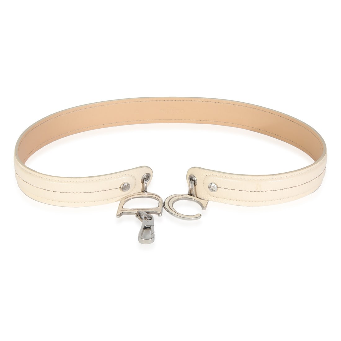 Christian Dior Vintage Beige Leather CD Charm Waist Belt 2005 Silver-Tone: Christian Dior Vintage Beige Leather CD Charm Waist Belt 2005 Silver-Tone Elevate your accessory game with this Christian Dior Vintage White Leather CD Charm Waist Belt. Crafted in Italy, this stylish