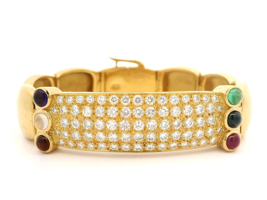 22k Yellow Gold 3.5ctw Diamond Bracelet with Gemstone Accents: 22k Yellow Gold 3.5ctw Diamond Bracelet with Gemstone Accents This stunning wide ID bracelet features a luxurious 22k yellow gold construction adorned with fiery diamonds and vibrant cabochon gemstone