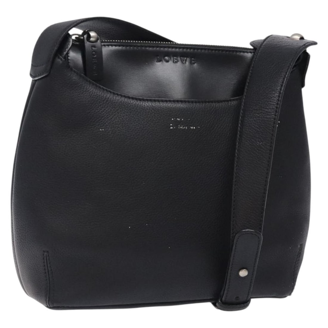 Black Leather Shoulder Bag by Loewe Vintage Model: Black Leather Shoulder Bag by Loewe Vintage Model This vintage Loewe shoulder bag for women features black leather construction with a compact design. It has a shoulder strap and metal fittings, showi