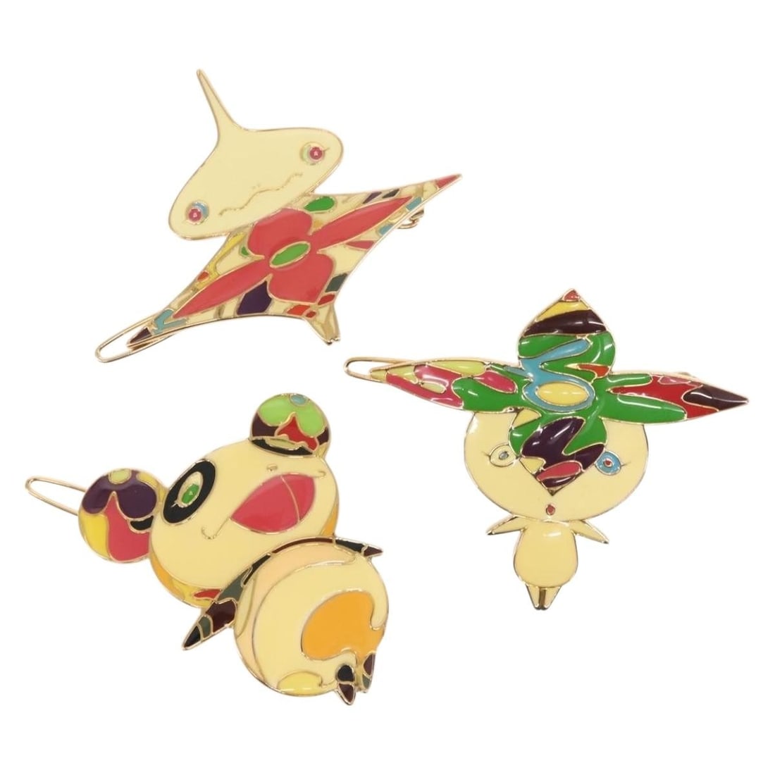 Louis Vuitton Takashi Murakami Metal Hair Clip M92595 White: Louis Vuitton Takashi Murakami Metal Hair Clip M92595 White This stylish hair clip from LOUIS VUITTON features a unique Takashi Murakami character design. Crafted from durable metal, it showcases a st