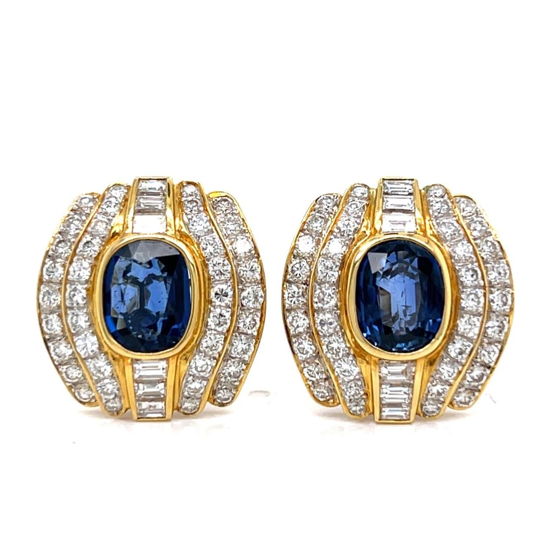 Elegant 18K Gold Sapphire and Diamond Earrings 5.00 Ct: Elegant 18K Gold Sapphire and Diamond Earrings 5.00 Ct Elegant and luxurious, these 18K Yellow Gold Earrings feature stunning sapphires and diamonds. Each earring is adorned with two sapphires, totali