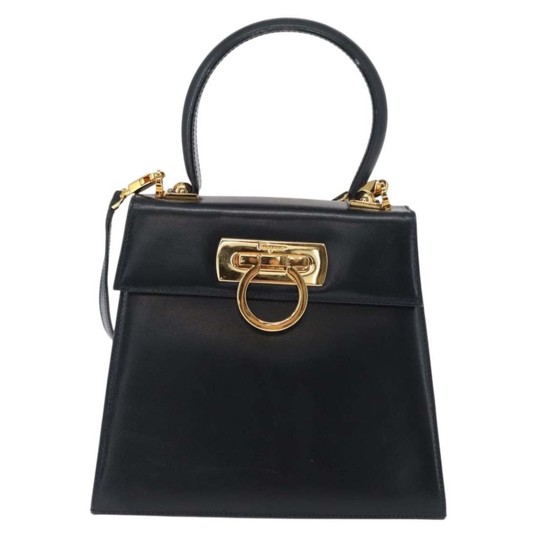 Gancini Convertible Navy Leather Satchel by Salvatore Ferragamo: Gancini Convertible Navy Leather Satchel by Salvatore Ferragamo This Salvatore Ferragamo Gancini Convertible Top Handle Bag is crafted from navy leather and designed for women. It features a top handl