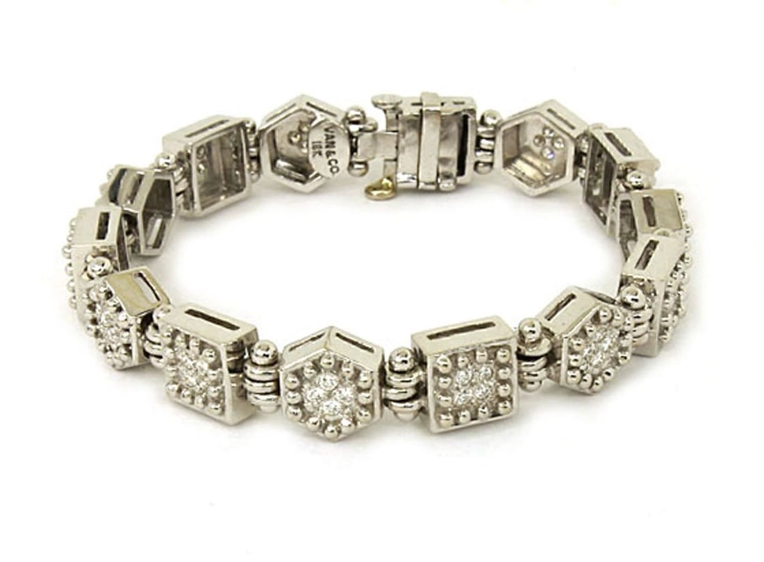 Diamond Octagon Square Link Bracelet in 18k White Gold by Ivan & Co.: Diamond Octagon Square Link Bracelet in 18k White Gold by Ivan & Co. This vintage octagon and square link bracelet is expertly crafted from solid 18k white gold, showcasing refined Italian design. The