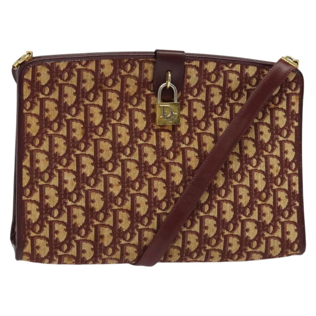 Red Trotter Canvas Shoulder Bag by Christian Dior France: Red Trotter Canvas Shoulder Bag by Christian Dior France This Christian Dior Trotter shoulder bag is crafted from red canvas and designed for women. The bag features a spacious interior and a practica