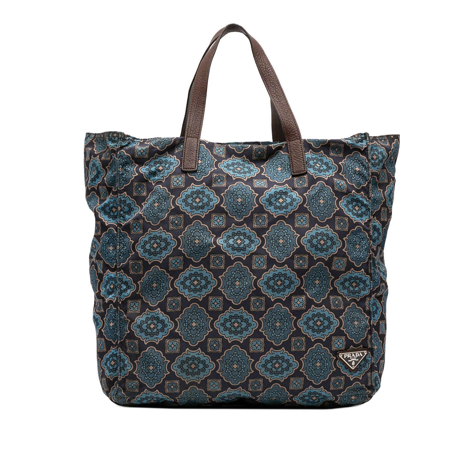 Prada Tessuto Stampato Blue Nylon Tote with Leather Trim: Prada Tessuto Stampato Blue Nylon Tote with Leather Trim The Prada Tessuto Stampato Tote is a stylish accessory that combines functionality and elegance. Crafted from printed nylon with luxurious leat
