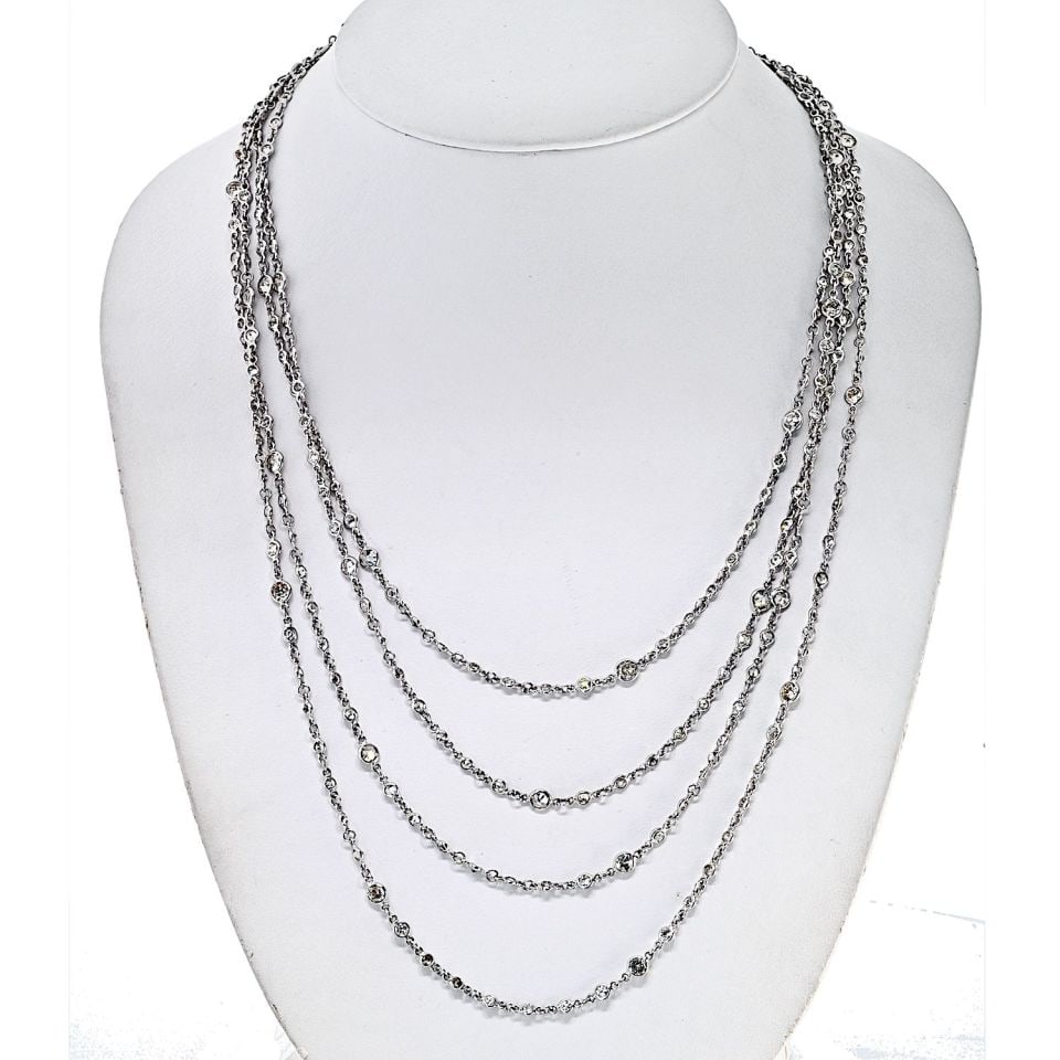 Platinum Diamonds By The Yard 38 Ct Necklace 89 Inch Elegance: Platinum Diamonds By The Yard 38 Ct Necklace 89 Inch Elegance This exquisite Platinum Diamond by The Yard necklace showcases a stunning total diamond weight of 38.00 carats, featuring dazzling round b