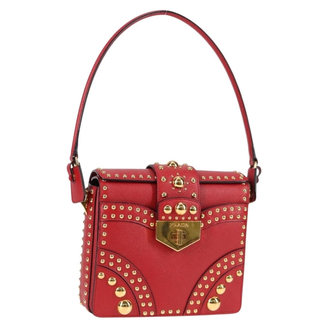 Red Prada Saffiano Leather Studded Shoulder Bag with Turn Lock: Red Prada Saffiano Leather Studded Shoulder Bag with Turn Lock This Prada Turn Lock Shoulder Bag features a striking red Saffiano leather exterior with studded detailing and a secure turn lock closure