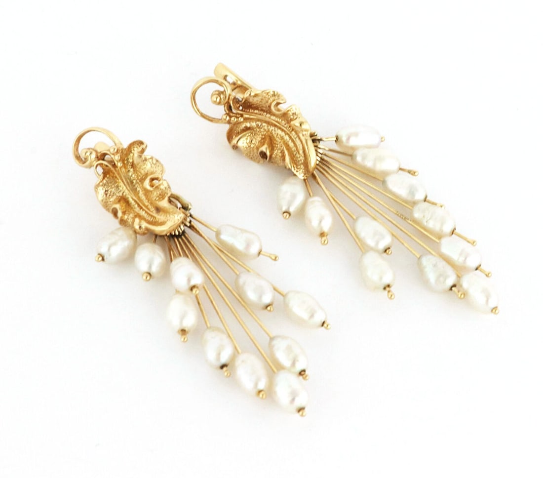 Convertible Dangle Earrings in 14k Yellow Gold with Freshwater Pearls: Convertible Dangle Earrings in 14k Yellow Gold with Freshwater Pearls These dangle earrings are crafted from 14k yellow gold and feature lustrous freshwater pearls. Designed in a convertible style, th