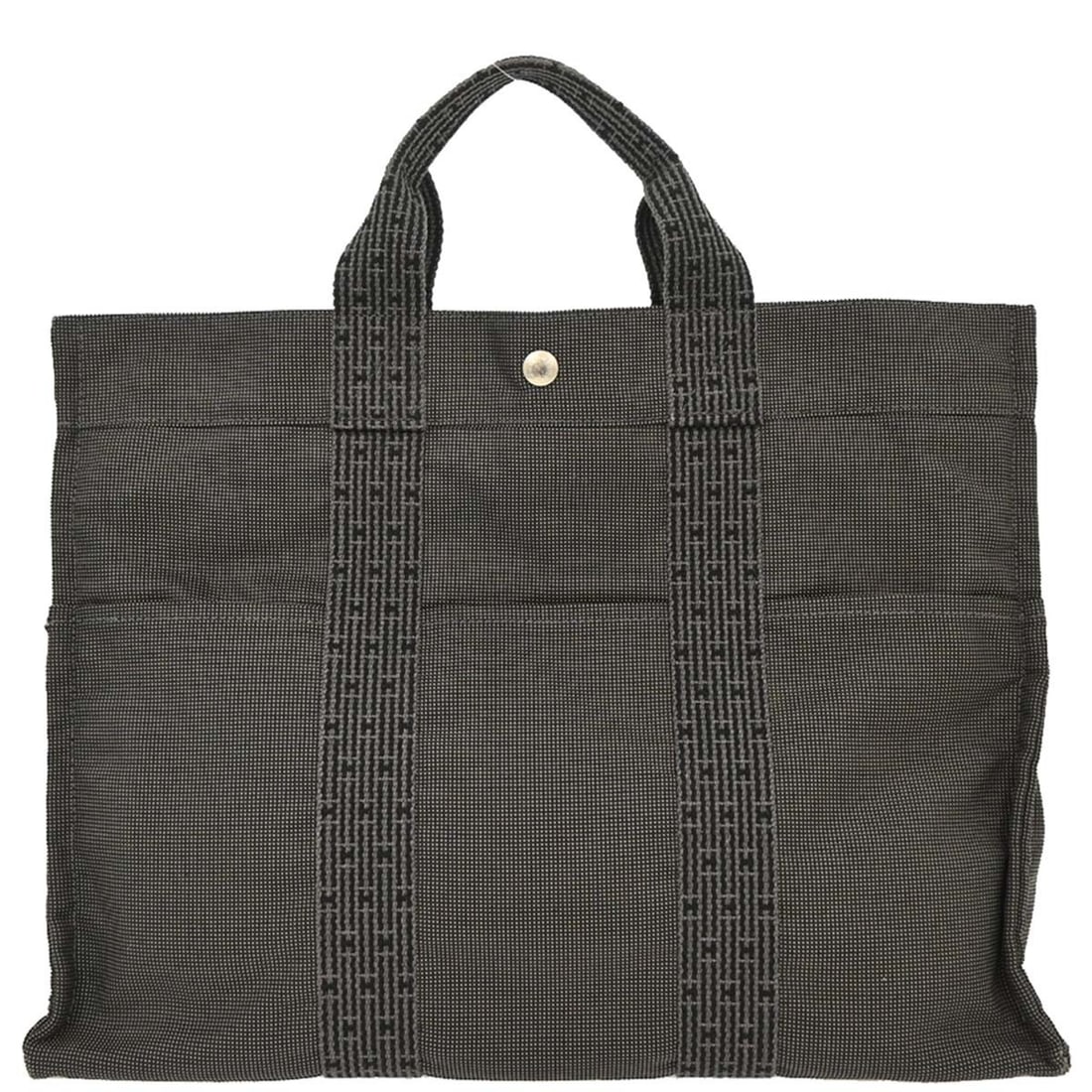 Hermes Gray Canvas Herline Tote MM Handbag with Silver Hardware: Hermes Gray Canvas Herline Tote MM Handbag with Silver Hardware Discover the elegance of the Hermes Gray Canvas Herline Tote MM Handbag, a perfect blend of functionality and luxury. This spacious