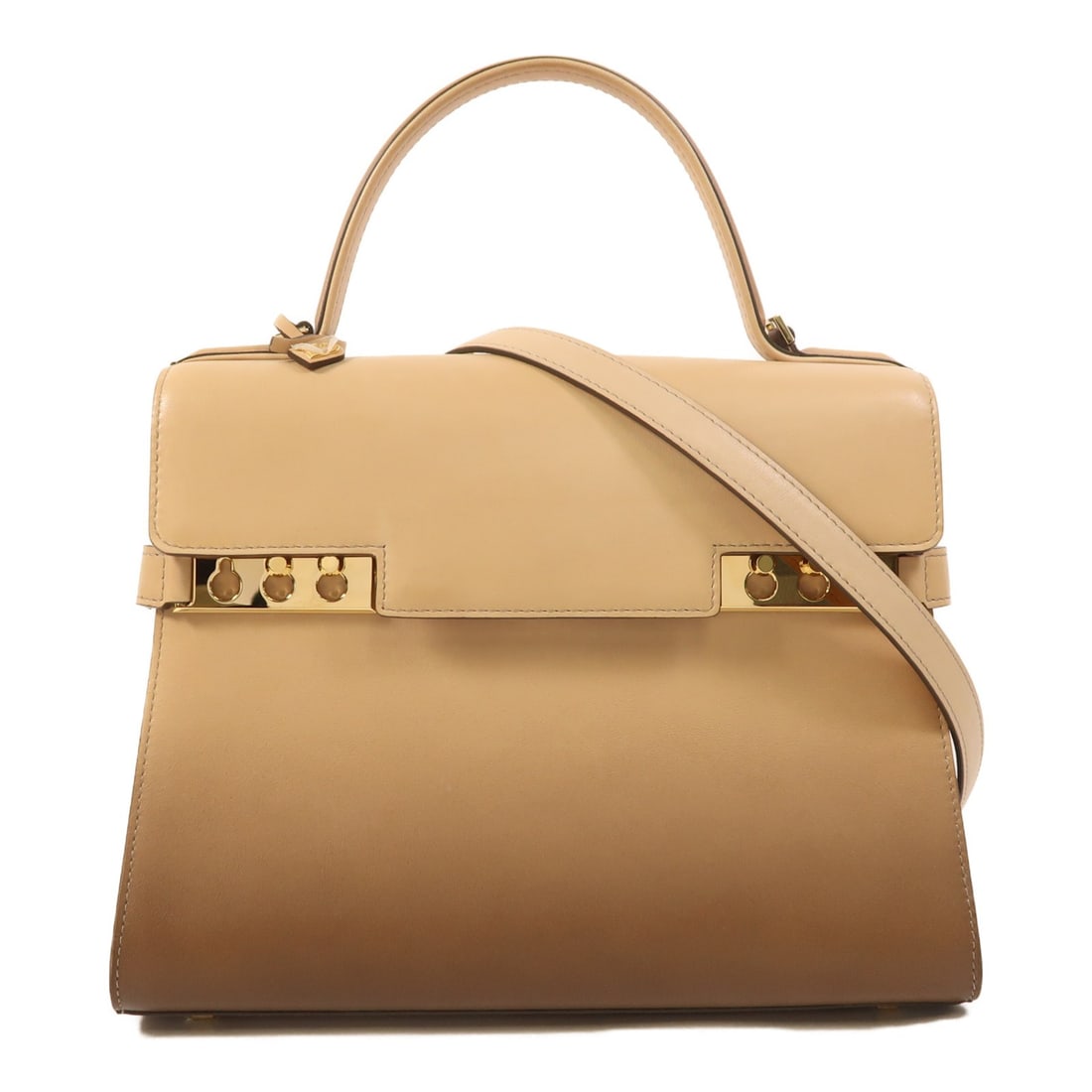 Delvaux Tempete MM Calfskin Beige Brown Two Way Shoulder Bag with Gold Hardware: Delvaux Tempete MM Calfskin Beige Brown Two Way Shoulder Bag with Gold Hardware This Delvaux Tempete MM is a versatile 2-way shoulder bag crafted from beige calfskin leather with brown accents. It fea