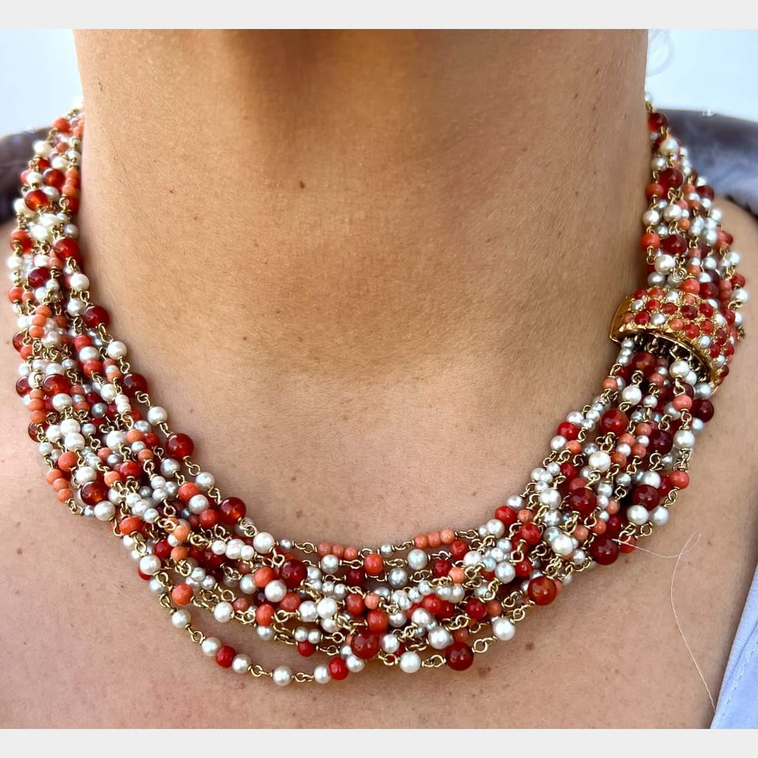 Tiffany & Co. 1970s 18K Yellow Gold Coral Pearl Carnelian Necklace: Tiffany & Co. 1970s 18K Yellow Gold Coral Pearl Carnelian Necklace This exquisite Tiffany & Co. necklace from the 1970s is crafted from luxurious 18K yellow gold and features stunning coral, pearl, an