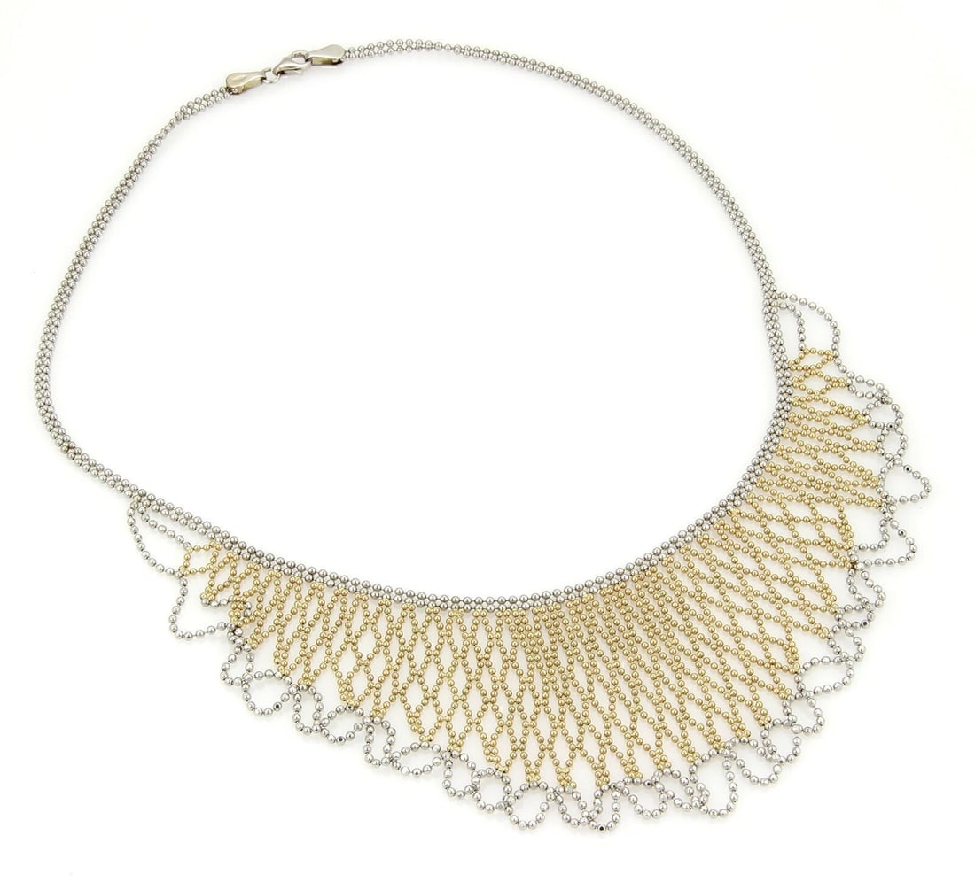 14k Yellow and White Gold Double Strand Beaded Drape Necklace 16.5 Inch: 14k Yellow and White Gold Double Strand Beaded Drape Necklace 16.5 Inch This double strand beaded wide fancy drape necklace is crafted in 14k two-tone gold, featuring both white and yellow gold elemen