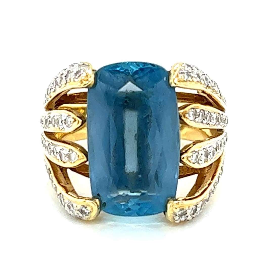 Stunning 18K Yellow Gold Blue Topaz Diamond Ring 9.00 Ct 107 Diamonds: Stunning 18K Yellow Gold Blue Topaz Diamond Ring 9.00 Ct 107 Diamonds This exquisite 18K yellow gold ring showcases a stunning blue topaz at its center, weighing approximately 9.00 ct. The ring is ele
