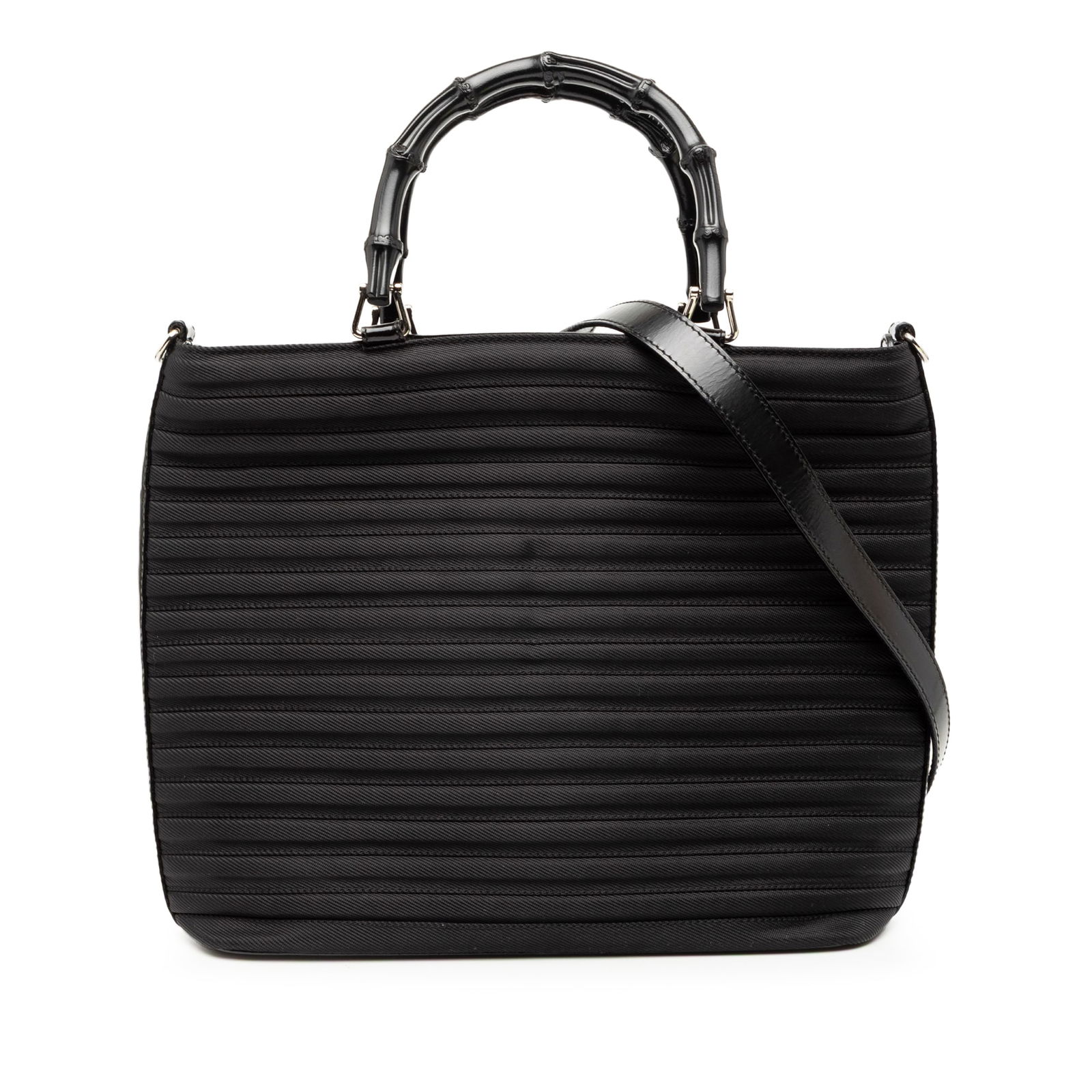 Black Quilted Nylon Satchel with Bamboo Handles and Leather Strap by Gucci: Black Quilted Nylon Satchel with Bamboo Handles and Leather Strap by Gucci This Gucci Nylon Bamboo Satchel features a quilted nylon body in black, distinctive bamboo top handles, a detachable flat lea