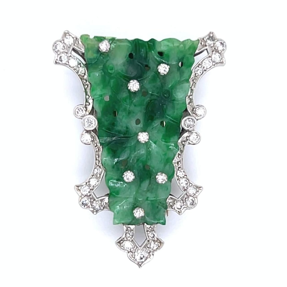 Art Deco Platinum Brooch with Jade and 38 Diamonds: Art Deco Platinum Brooch with Jade and 38 Diamonds This exquisite Art Deco brooch features a stunning combination of jade and diamonds set in platinum. Weighing 13.6 grams, the brooch is adorned with